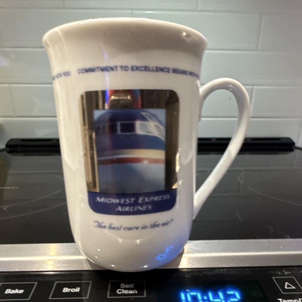 Midwest Express Airlines Collectible Mug White Plane Image Commitment Slogan