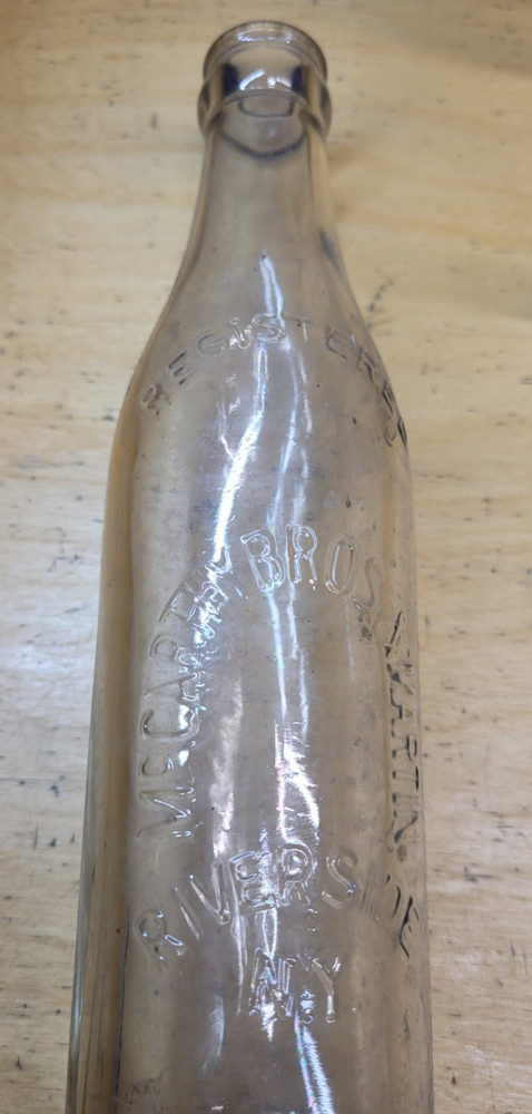 7 Vintage Bottles, 1 with Stopper