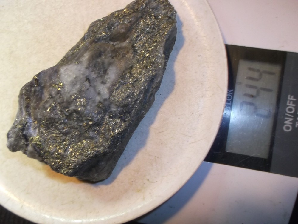 Gold, silver, copper, 244 grams samples ,ore high grade .
