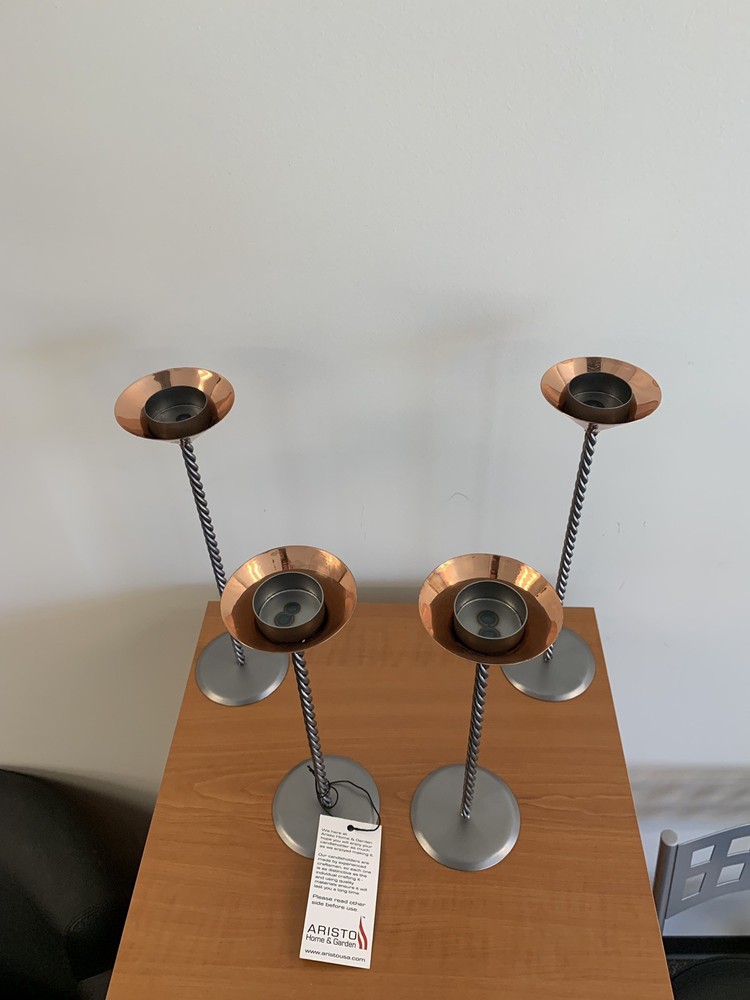 Four Copper Tea candle holders with twisted stem