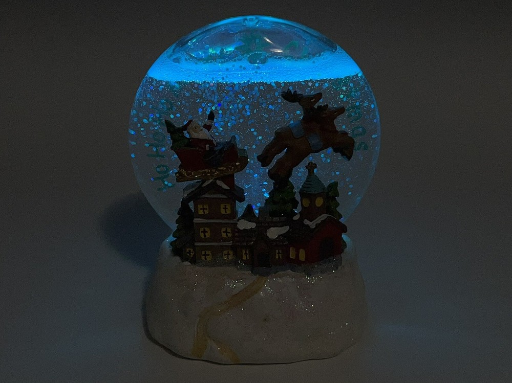 Led light up santa and sleigh snow globe