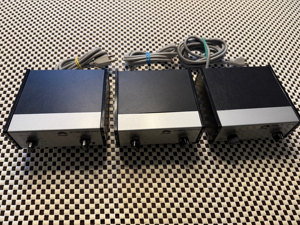 Three Dymek DA 100D antenna system indoor control units