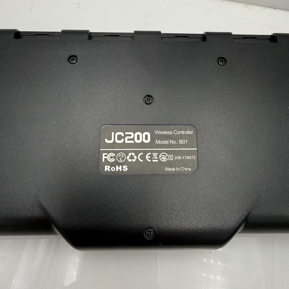 Nintendo Switch JC200 Wireless Gamepad Attachment Controller Grip Black B01