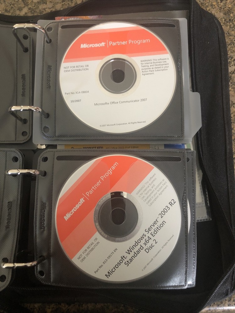 Microsoft Action Pack-Asst. Software 48 CDs- Many Keys Included