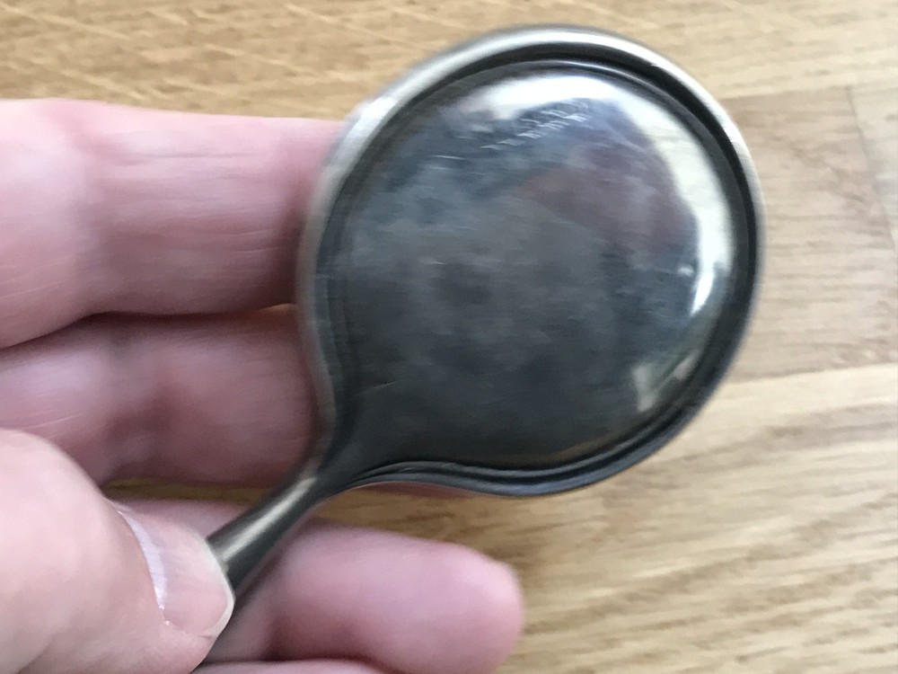 nice looking small size solid silver vanity mirror