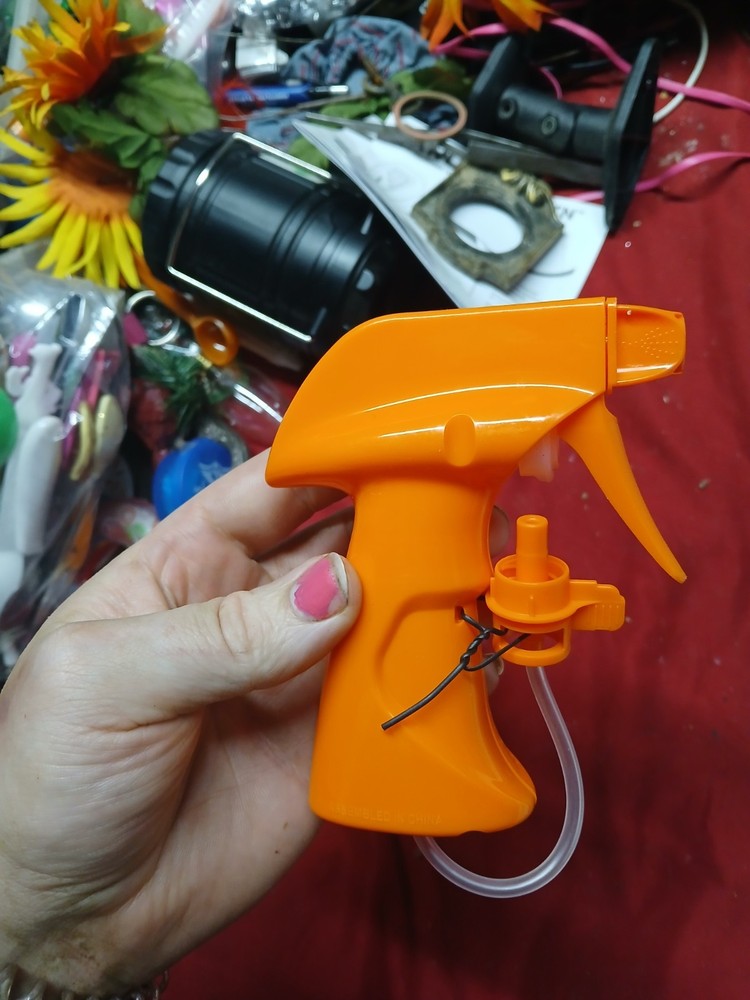 yellow plastic spray trigger handle