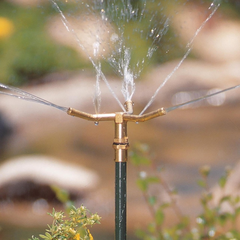 3-Arm Rotating L awn Sprinkler on Adjustable Step Spike