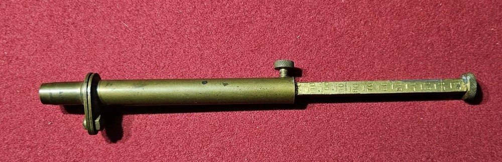 VINTAGE BRASS ADJUSTABLE BLACK POWDER MEASURE FLINTLOCK