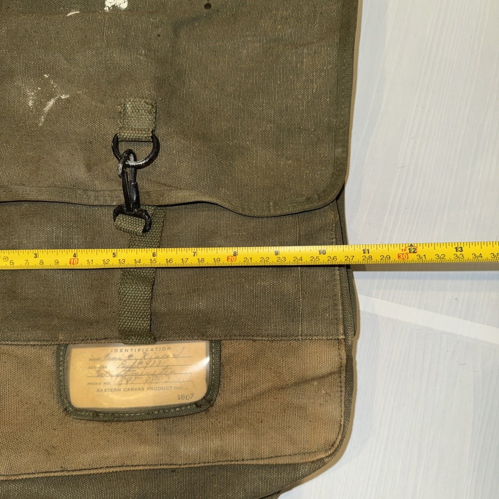 Vintage backpack made of thick green sackcloth