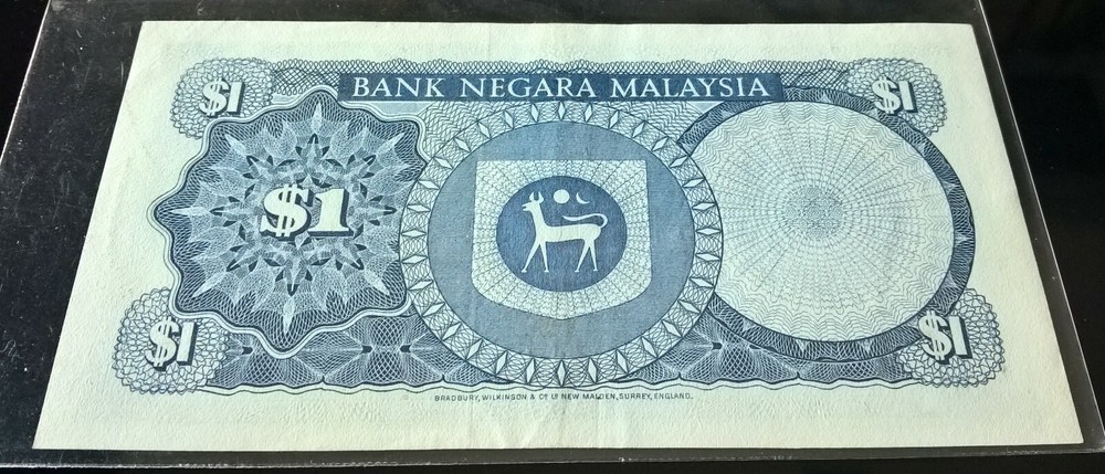 4th Series Malaysia Ringgit $1 Nice Number AU Foxing Handling Mark