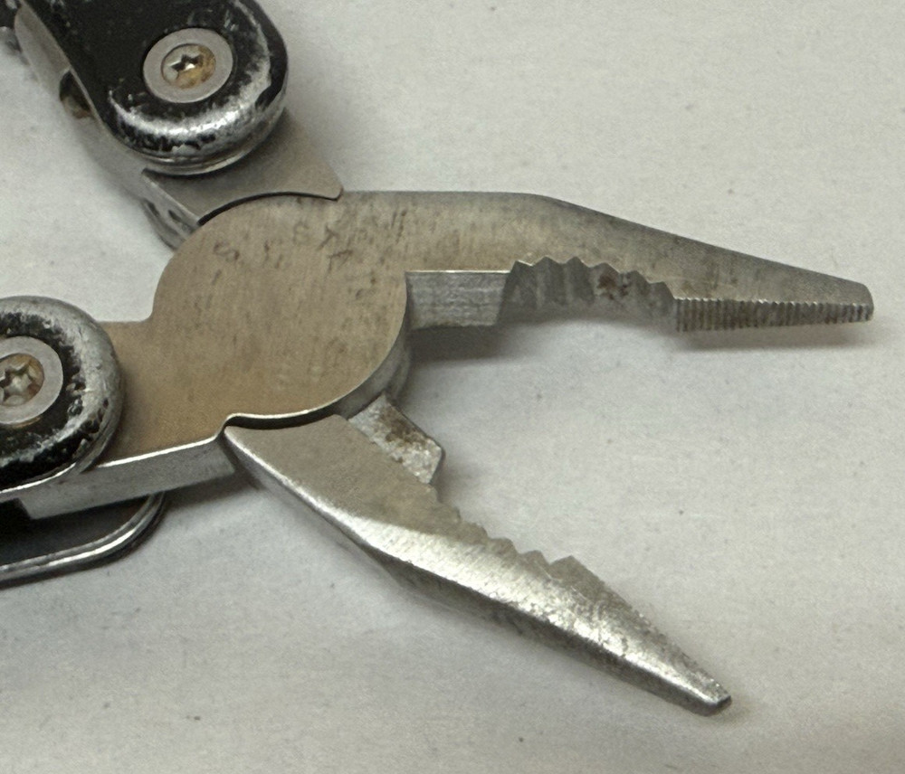 Snap-On Multi-Tool Knife Screwdriver File Saw Pliers