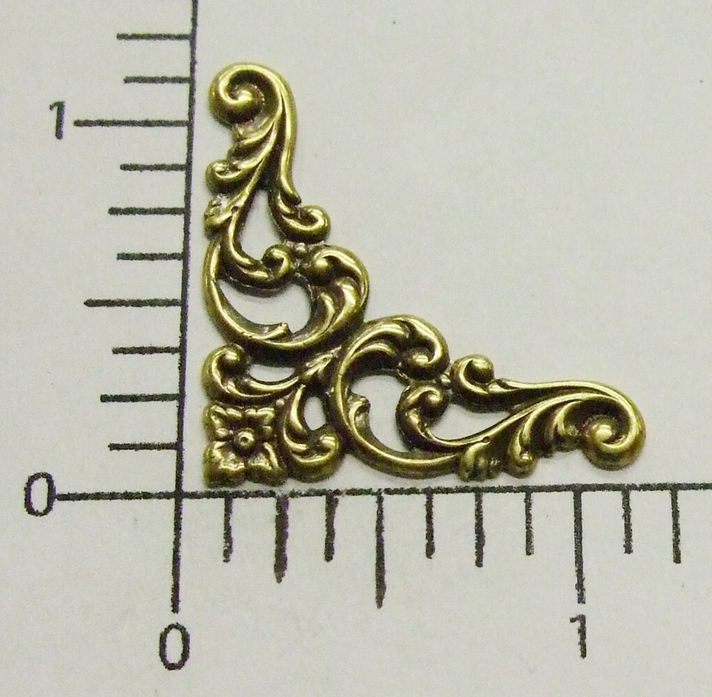 23643- 4 Pc. Victorian Corner Jewelry Finding Stamping Brass Oxidized