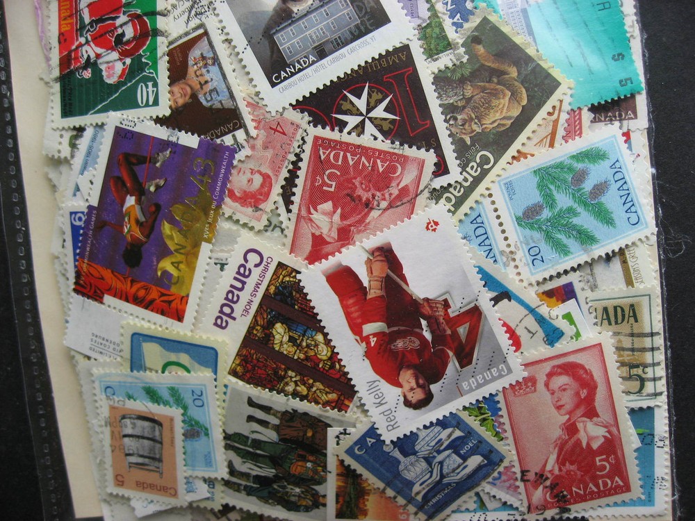 Canada colossal mixture(duplicates,mixed cond) 4000 old,new,35%comems,65%defins
