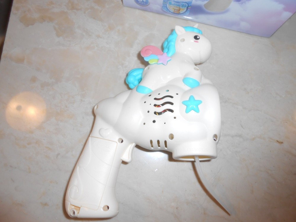 Blue Unicorn Bubble Gun Blower in box.