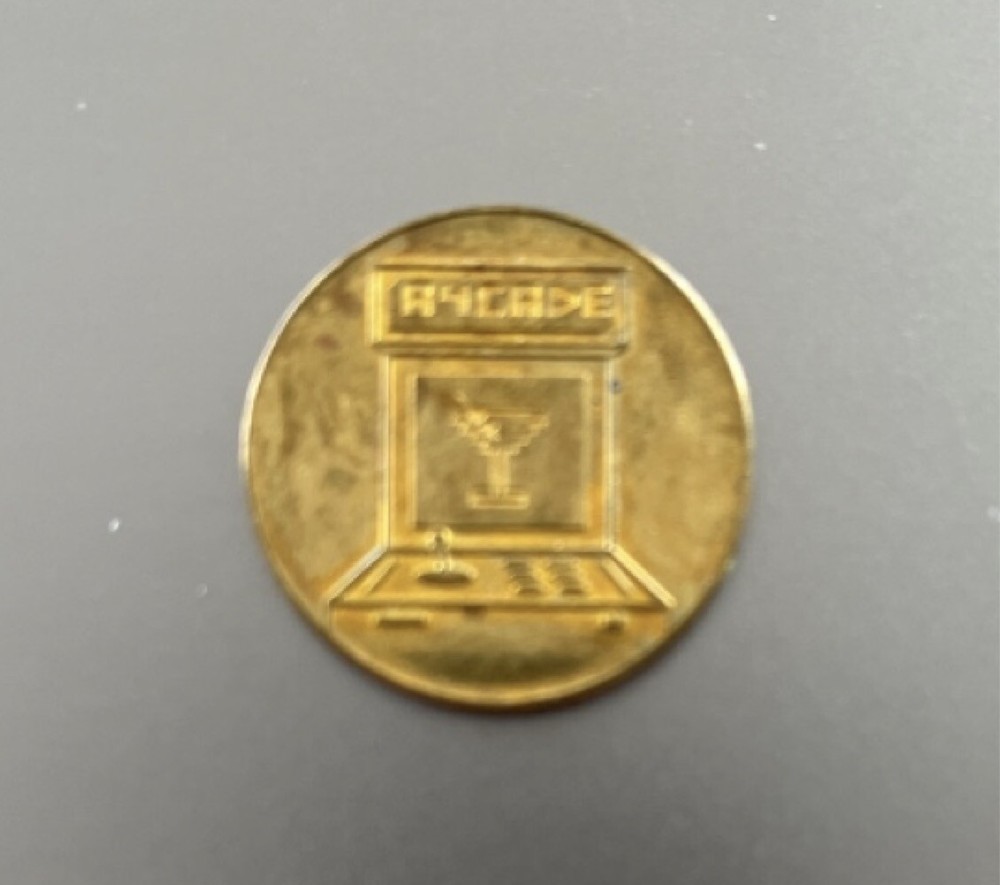vintage arcade token Roxy's Cambridge, Massachusetts