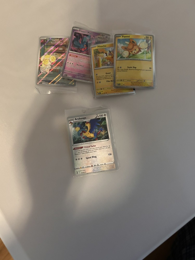 Unsorted assortment of 100 Pokémon cards ￼-all basic cards-￼