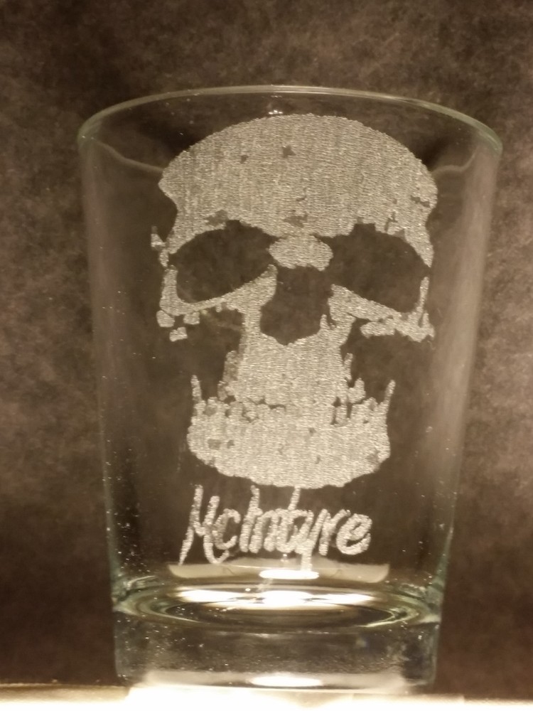 2 Skull etched shot glass. Can be personalized. Different designs available!