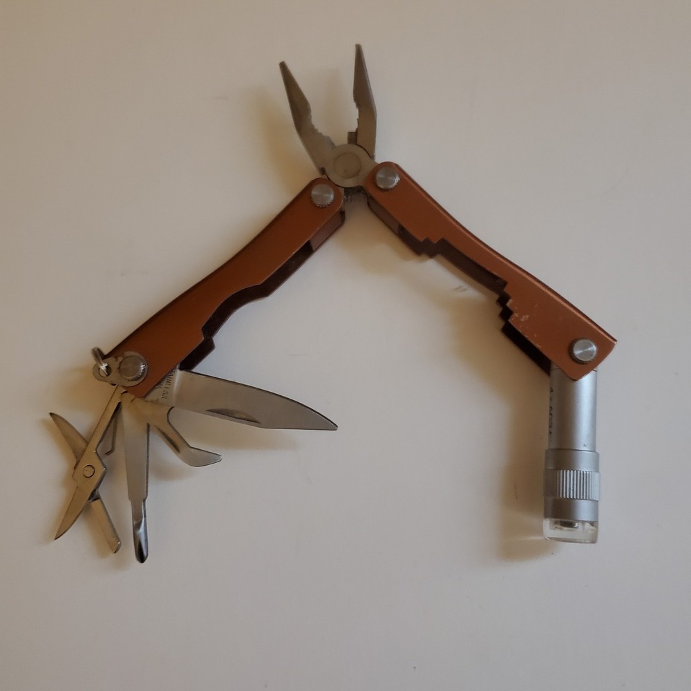 8 Function Scout Tool includes LED Light By Eddie Bauer Copper