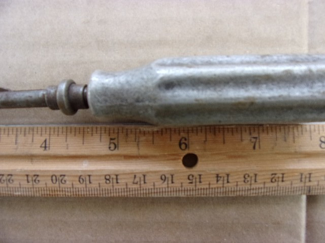 vintage flathead holding screwdriver cast handle