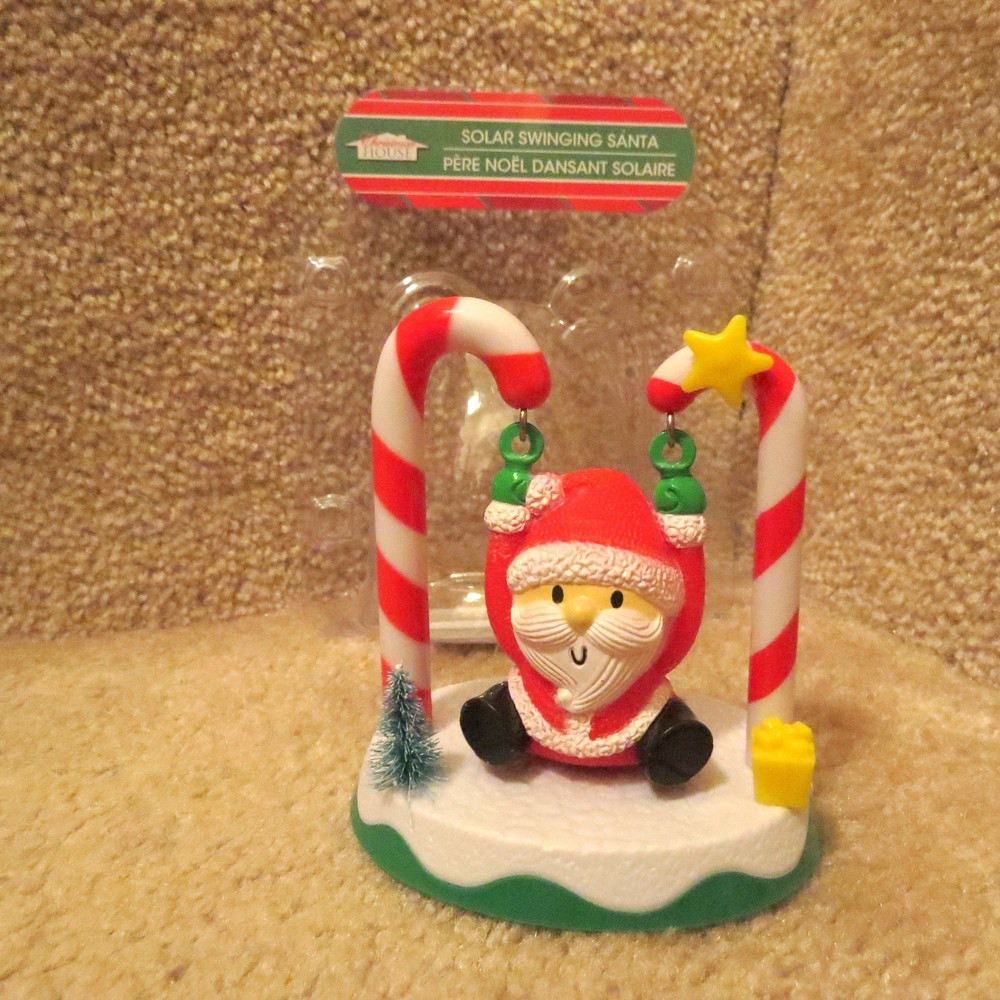 Solar Swinging Santa on Candy Canes