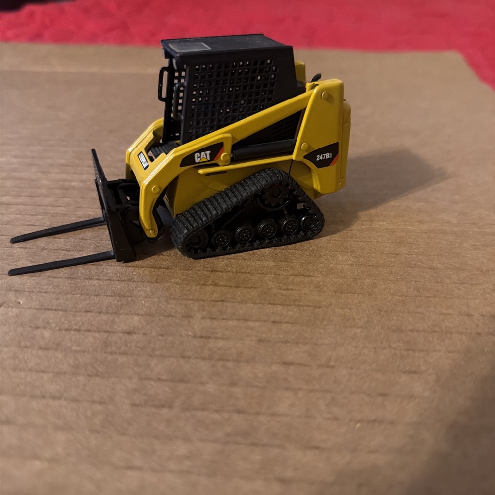 Norscot 55102 • Caterpillar • CAT 247 Multi Terrain Loader Work Tools 1:32 Scale