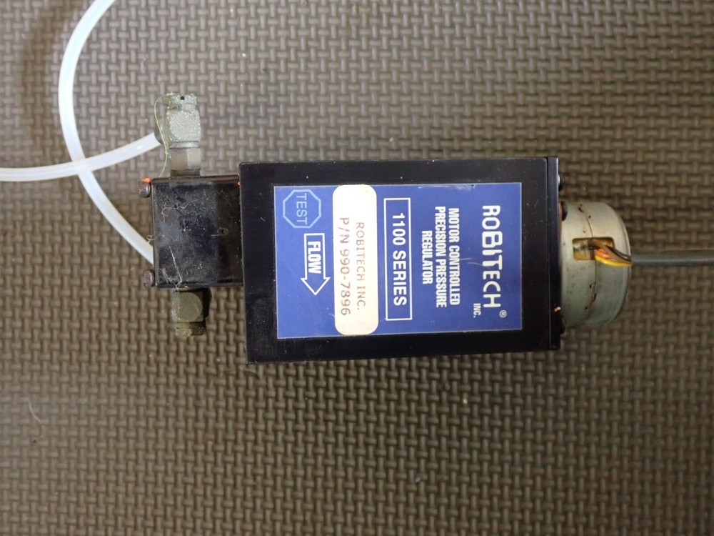 Gas flow regulators and desiccant