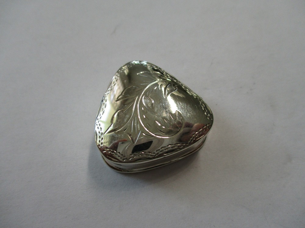 Sterling silver pill box triangle shape engraved with a flower on top hallmarked