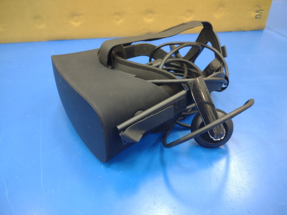 Oculus Rift VR Headset with controllers, sensors, and original box