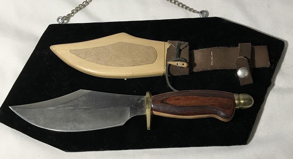 Bowie Knife & sheath, on display rack