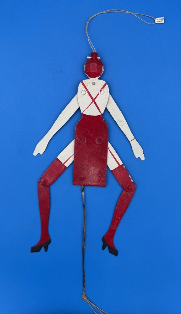 PAINTED METAL "JUMPING JILL" PULL STRING TOY FIGURE