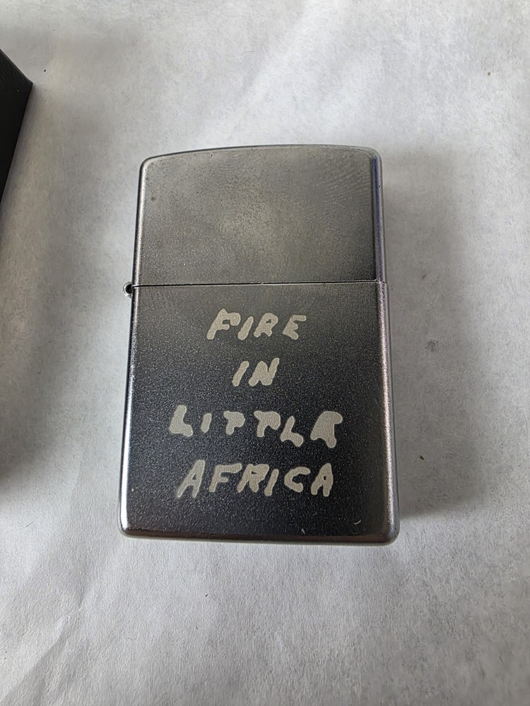 Fire In Little Africa Zippo Lighter Unfired