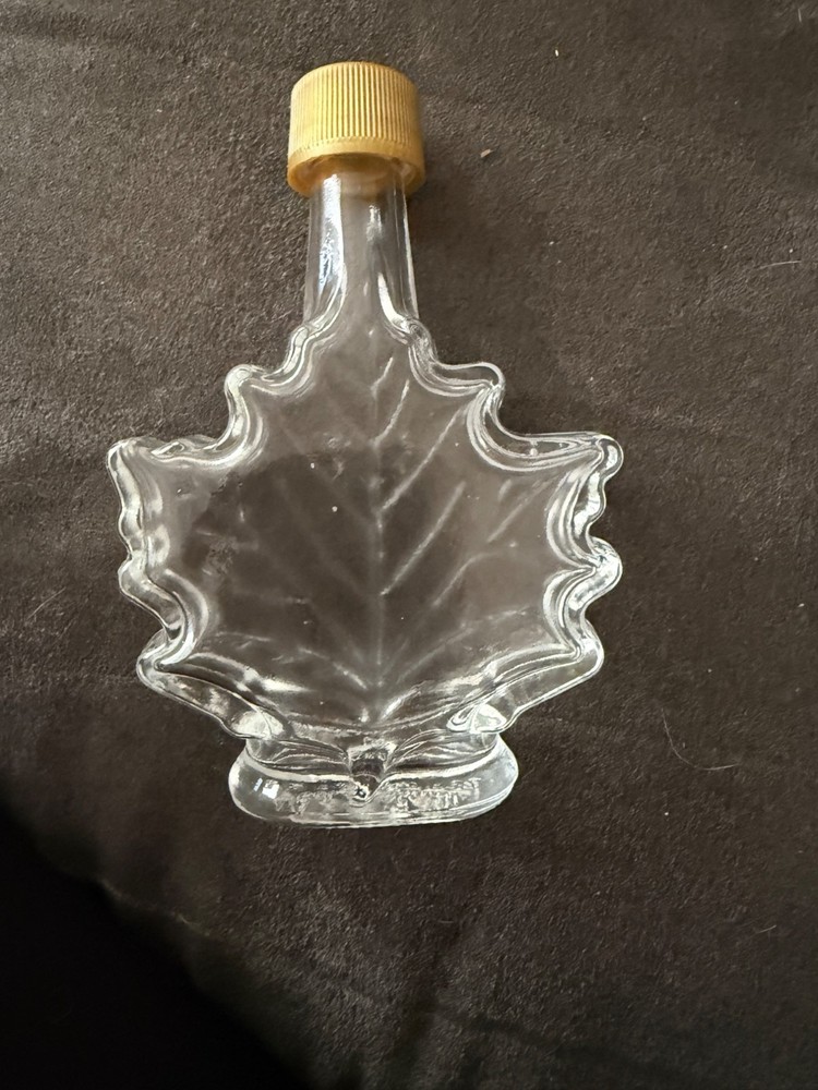 Maple Leaf-Shaped Clear Glass Bottle