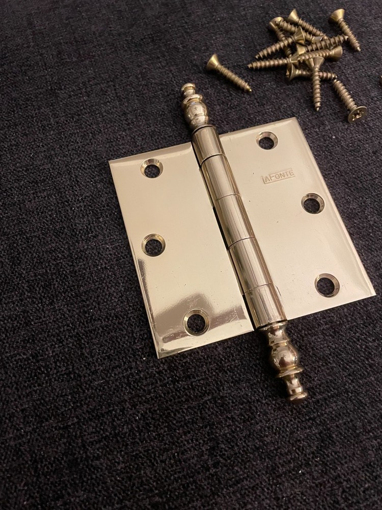 A pair of LaFonte solid brass steeple hinges, polished