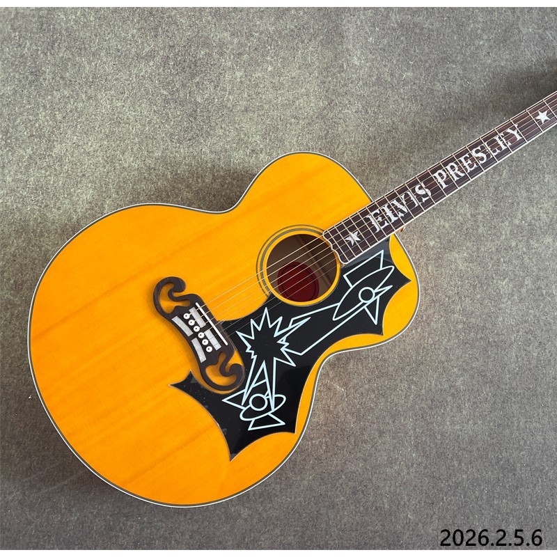 Acoustic guitar yellowish Solid spruce board top maple back and side