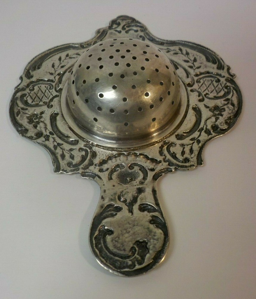Continental .800 Silver Tea Strainer, Repousse Design, c. 1900, 58 grams