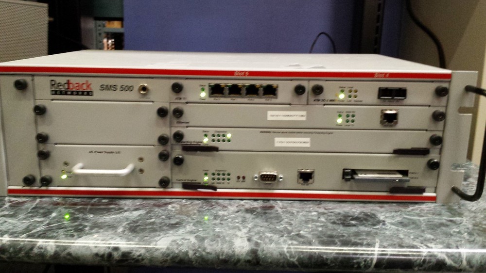 Redback Networks SMS 500 W/ ATM-1, ETHERNET, FORWARDING ENGINE, CONTROL ENGINE,