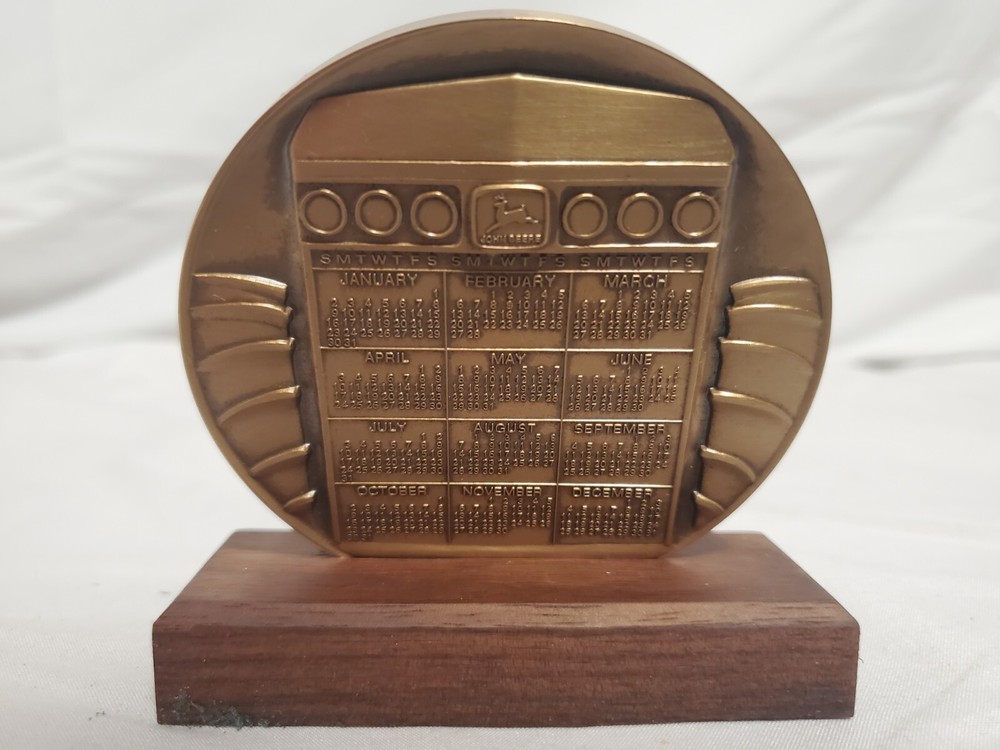 JOHN DEERE 1983 GENERATION TRACTORS CALENDAR MEDALLION