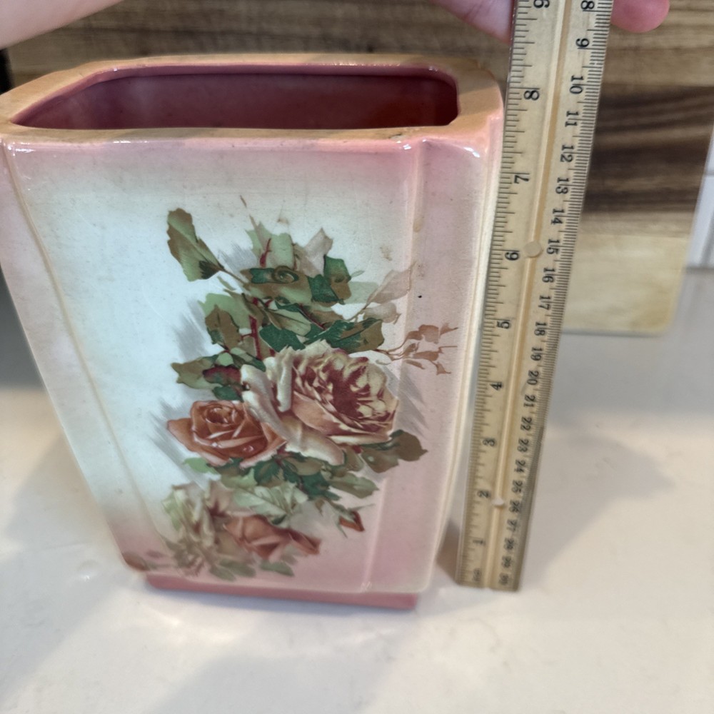 vintage ceramic piece, likely a planter, vase