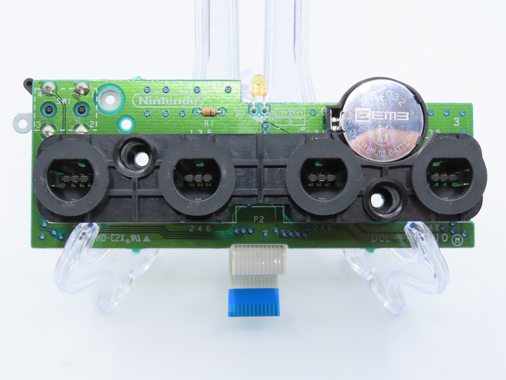 Nintendo GameCube controller port with battery holder
