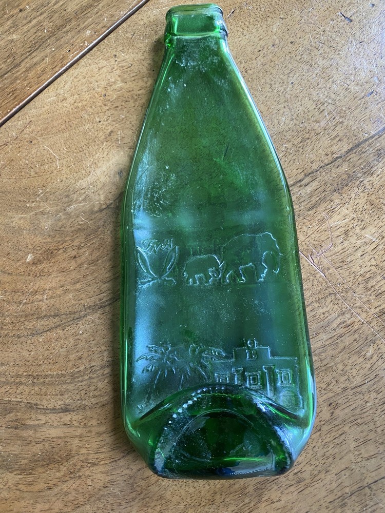 Squashed Green Glass Bottle 23 cms Long with Oriental Design