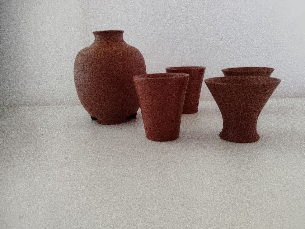 Reddish-brown ceramic sake bottle and 4-piece choko set