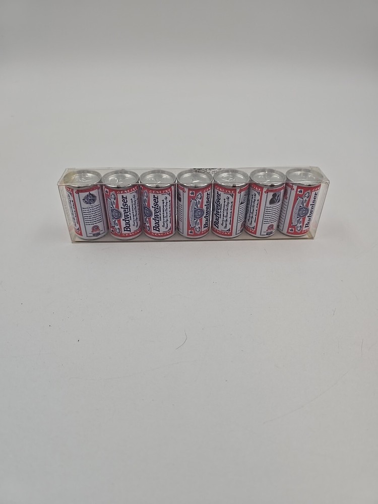 7 Miniture Budweiser cans