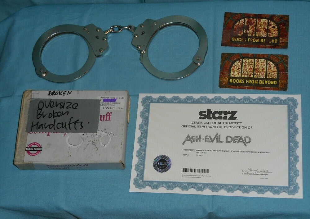 original ASH VS. EVIL DEAD HANDCUFFS & BOOKS FROM BEYOND CARDS prop w/ COA