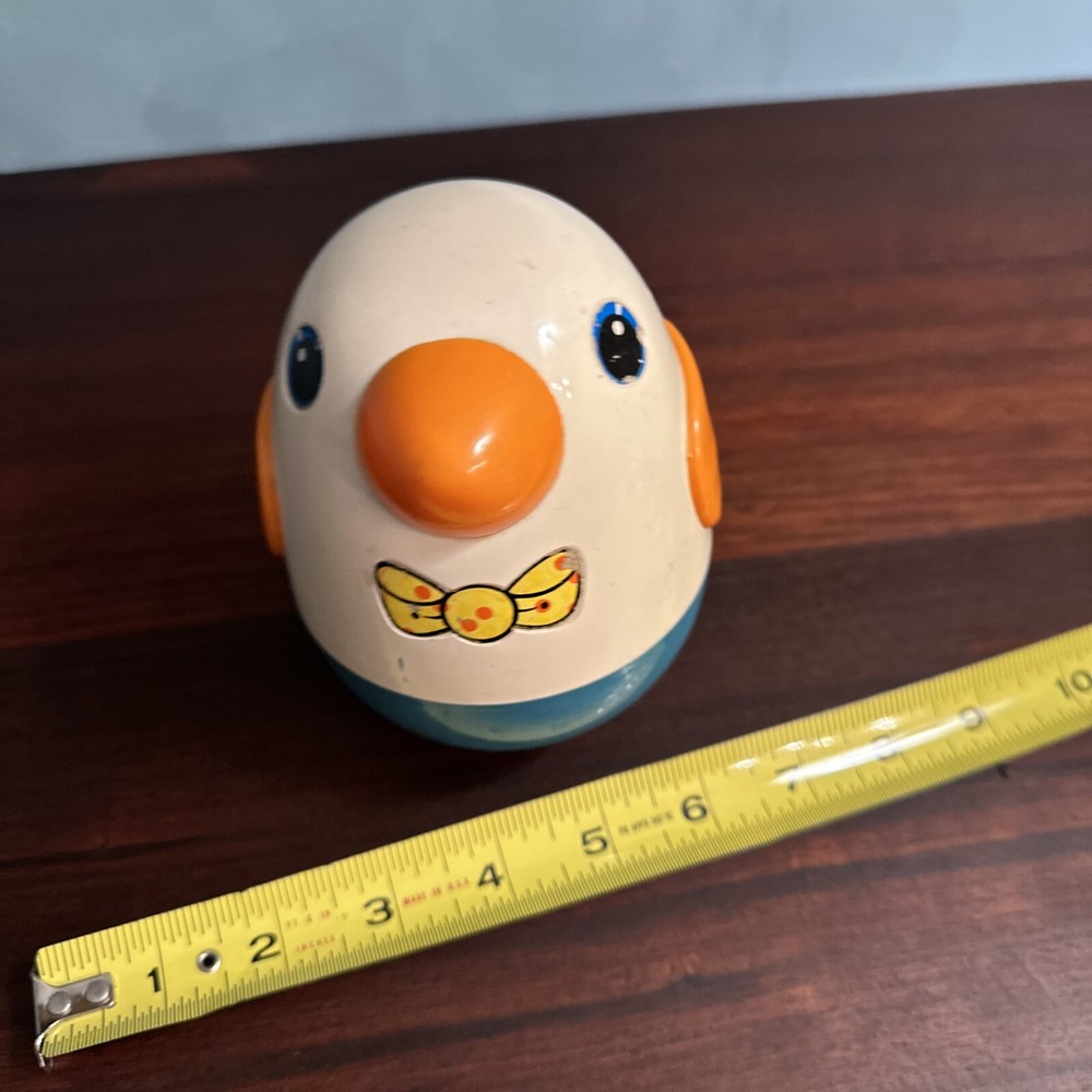 Vintage Musical Roly Poly Penguin pull behind toy