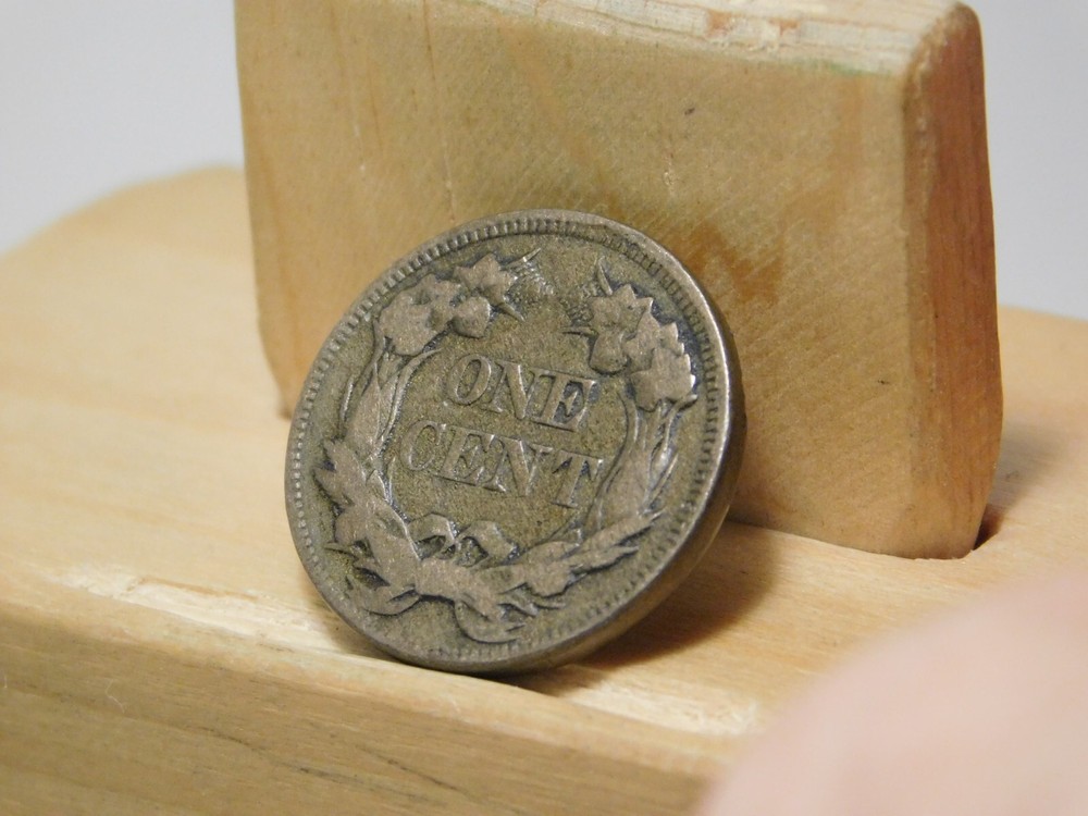 1857 U.S. Flying Eagle cent, lamination error at edge