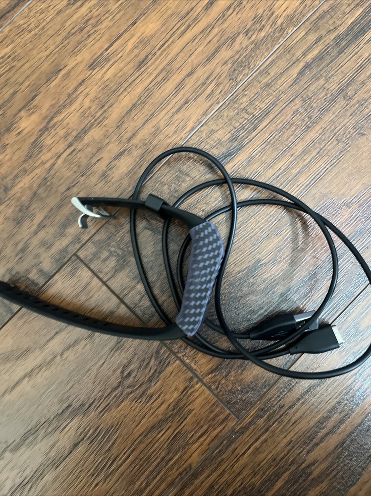 Fitbit Surge Wristband Activity Tracker Doesn’t Hold A Charge. With Charger