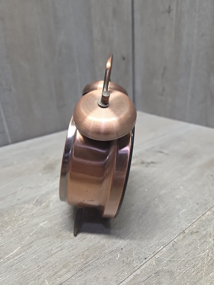 John Deere, aged copper, single hammer alarm clock. Works! Nice!