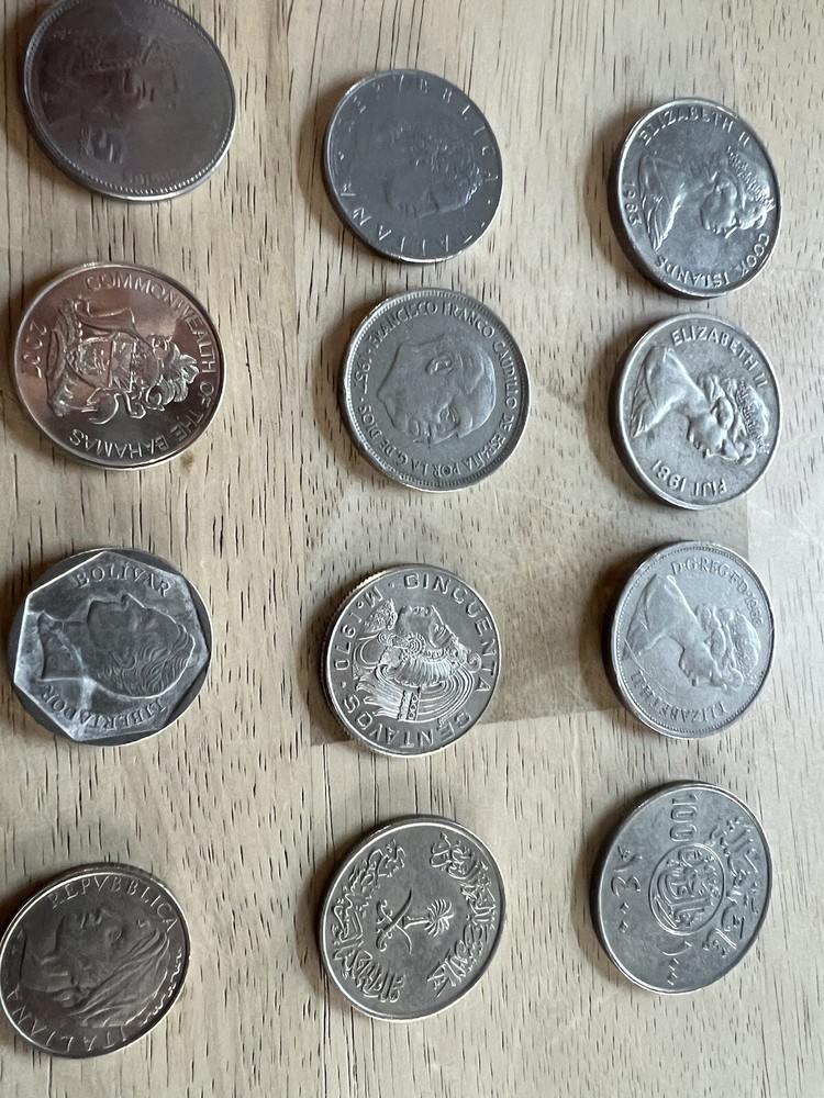 Assorted foreign coins. 26 Coins In Total