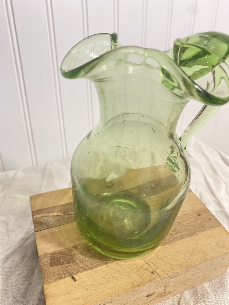 green glass pitcher vintage