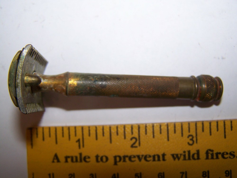 Vintage Gillette safety razor with comb